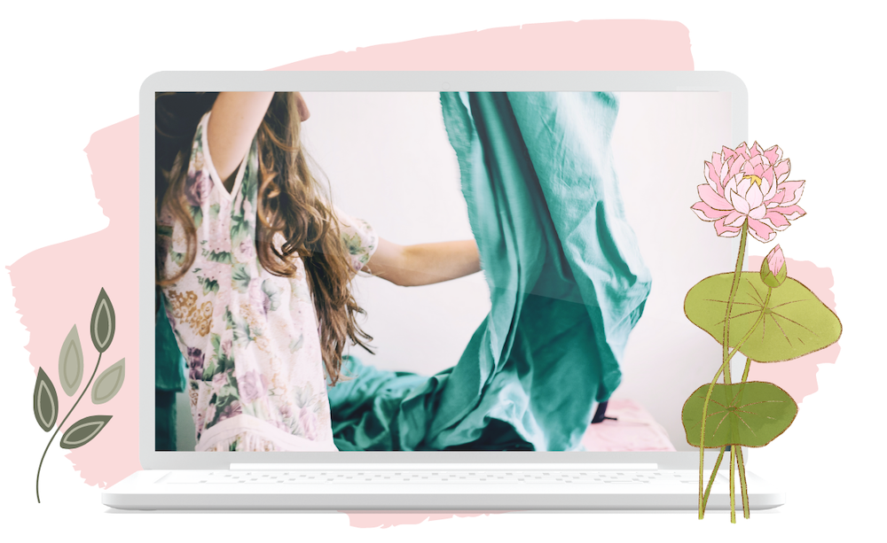 photo of woman holding fabric, displayed in a laptop frame